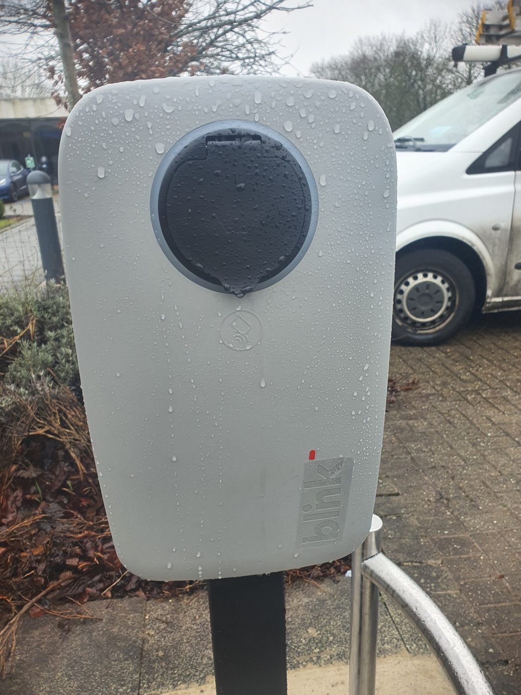 Close-up of an outdoor workplace electric vehicle charging point