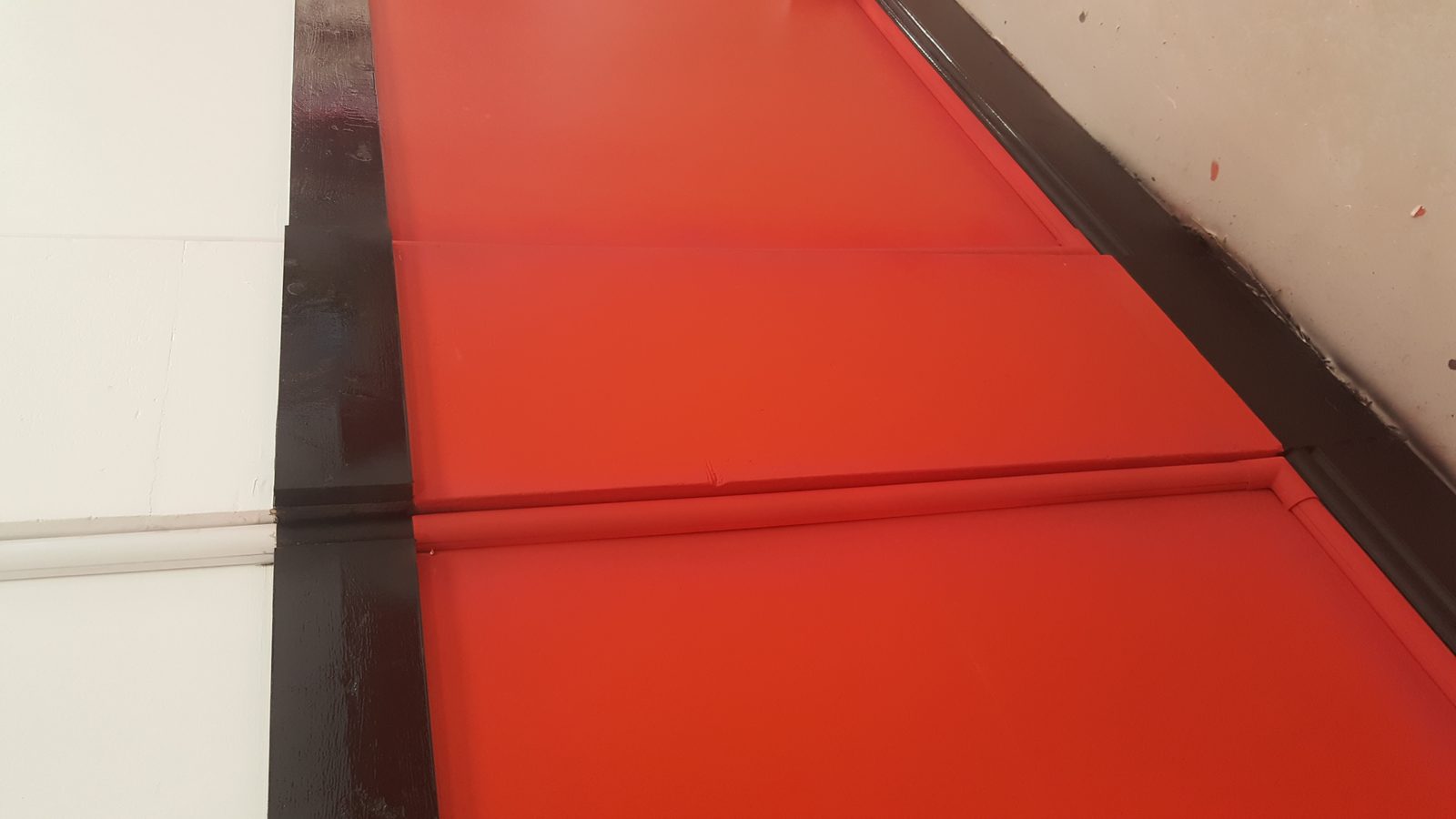 Close-up of electrical containment and trunking installed as part of a commercial electrical installation.