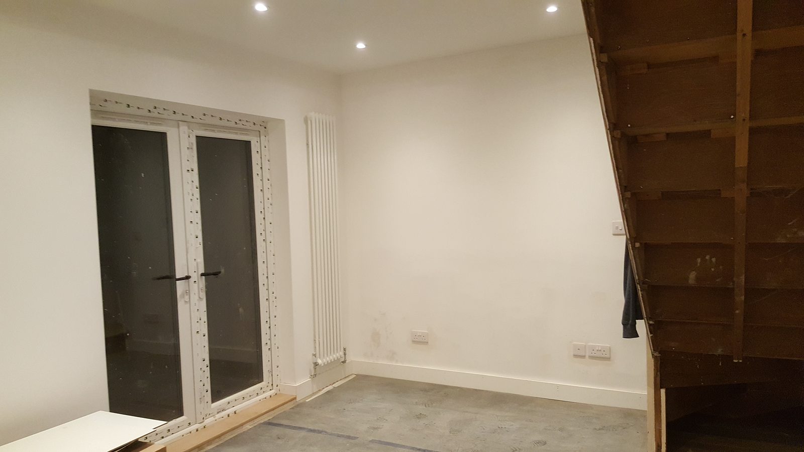 Recessed downlights installed during refurbishment.